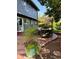 A serene backyard patio area, perfect for outdoor relaxation and entertaining, extends from a blue home at 4196 S Reading Way, Denver, CO 80237