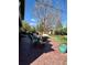 Outdoor patio space with dining area, seating, and view of the backyard at 4196 S Reading Way, Denver, CO 80237