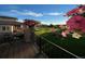 Captivating deck view with lush backyard, landscaping, and picturesque views at 16323 River Haven Way, Morrison, CO 80465