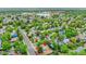 Aerial neighborhood view of the property showcasing its location with mature trees at 4848 S Pitkin Way, Aurora, CO 80015