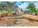 The backyard features a deck, a shed, a wooden fence, and planting beds at 4848 S Pitkin Way, Aurora, CO 80015