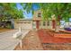 Charming two-story home with attached garage and manicured front yard at 4848 S Pitkin Way, Aurora, CO 80015