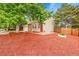 Charming two-story home with light colored siding and well maintained front yard at 4848 S Pitkin Way, Aurora, CO 80015