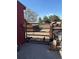 Exterior gate of animal pen with access to barn and various small shelters at 14347 E 134Th Ave, Brighton, CO 80601