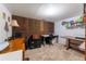 Office area with carpet flooring, multiple desks, and ample storage space at 14347 E 134Th Ave, Brighton, CO 80601
