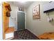 Welcoming entryway with coat rack and storage bench at 14347 E 134Th Ave, Brighton, CO 80601