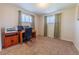 Cozy office space with a desk and carpeted floors at 14347 E 134Th Ave, Brighton, CO 80601