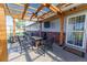 Covered patio with a fan and outdoor furniture offers a great space to relax and entertain at 14347 E 134Th Ave, Brighton, CO 80601
