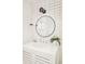 Modern bathroom featuring a sleek vanity, stylish mirror, and contemporary fixtures at 1884 S Ivy St, Denver, CO 80224