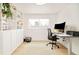 Bright room with built-in shelving and a desk, ideal for a home office setup at 1884 S Ivy St, Denver, CO 80224