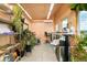 Interior view of office outbuilding with lots of plants and natural light at 1884 S Ivy St, Denver, CO 80224
