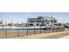 Exterior photo of a modern clubhouse with a pool and playground in a Gathering-friendly community at 27274 E Lakeview Pl, Aurora, CO 80016