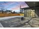 Covered patio with fire pit and snowy backyard at 3289 S Eudora St, Denver, CO 80222