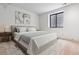 Basement bedroom with a window and neutral decor at 3289 S Eudora St, Denver, CO 80222