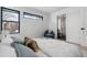 Cozy bedroom with an ensuite bathroom and sitting area at 3289 S Eudora St, Denver, CO 80222