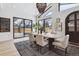 Bright dining room with sliding doors to backyard at 3289 S Eudora St, Denver, CO 80222