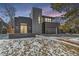 Modern two-story home with gray siding and a sleek design at 3289 S Eudora St, Denver, CO 80222