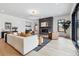 Spacious living room with hardwood floors and fireplace at 3289 S Eudora St, Denver, CO 80222