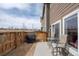 Cozy patio featuring a grill and table with chairs with a wooden fence to define the space at 14700 E 104Th Ave # 805, Commerce City, CO 80022