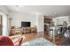 Open concept living area with a living room and kitchen at 14700 E 104Th Ave # 805, Commerce City, CO 80022