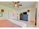 Bedroom with large dresser, walk-in closet, and a connecting bathroom at 11303 Vernon Way, Parker, CO 80134