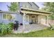 Outdoor patio with stone flooring and a covered seating area, perfect for entertaining guests and enjoying the outdoors at 11303 Vernon Way, Parker, CO 80134