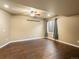 Spacious living room with dark flooring, recessed lighting, and a ceiling fan at 15145 W Washburn Ave, Denver, CO 80228