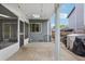 Backyard features a covered deck, patio, and views of the home's exterior at 6017 S Pierson St, Littleton, CO 80127