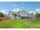 This home features a backyard with a covered patio, perfect for outdoor living and entertaining at 6017 S Pierson St, Littleton, CO 80127