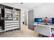 Well lit office space with built in storage and large monitor for working from home at 6017 S Pierson St, Littleton, CO 80127
