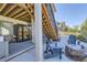 Backyard featuring a patio with an outdoor sauna and a fire pit seating area at 16345 Spanish Peak Way, Broomfield, CO 80023