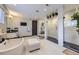Elegant bathroom with walk in shower, soaking tub and double vanity at 16345 Spanish Peak Way, Broomfield, CO 80023
