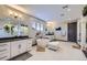 Spa-like bathroom with dual vanities, soaking tub and elegant fixtures at 16345 Spanish Peak Way, Broomfield, CO 80023