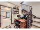 Functional home office with built-in desk and convenient access to the staircase at 16345 Spanish Peak Way, Broomfield, CO 80023