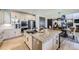 Spacious kitchen with granite countertops, stainless appliances, and island with sink and seating at 16345 Spanish Peak Way, Broomfield, CO 80023