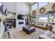 Spacious living room with high ceilings, large windows, and modern furnishings at 16345 Spanish Peak Way, Broomfield, CO 80023
