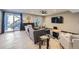 Finished basement featuring a modern entertainment area and walk-out access at 16345 Spanish Peak Way, Broomfield, CO 80023