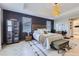 Spacious main bedroom with lots of natural light and a decorative rug at 16345 Spanish Peak Way, Broomfield, CO 80023
