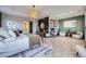 Luxurious main bedroom with decorative rug and sitting area at 16345 Spanish Peak Way, Broomfield, CO 80023