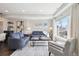 Bright living room boasts comfortable seating, natural light, and stylish accents, ideal for relaxation and gatherings at 2624 N Clay St, Denver, CO 80211