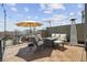 Inviting roof deck featuring comfortable seating, a heater, and panoramic views for enjoyable outdoor living at 2624 N Clay St, Denver, CO 80211