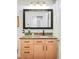 Bathroom vanity featuring a granite countertop, stylish drawers and a large mirror at 1700 Bassett St # 314, Denver, CO 80202