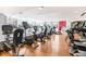 Modern community gym with multiple exercise machines and large windows at 1700 Bassett St # 314, Denver, CO 80202