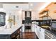 Modern kitchen featuring an island, stainless steel appliances, and sleek cabinetry at 1700 Bassett St # 314, Denver, CO 80202