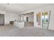 Spacious unfinished living room with sliding glass doors and recessed lighting at 1286 Lisbon Dr, Parker, CO 80138