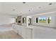 Unfinished living room showcasing views of the yard and recessed lighting at 1286 Lisbon Dr, Parker, CO 80138