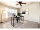 Bright office space with modern desk, décor, and a large window at 18397 E Alabama Pl # D, Aurora, CO 80017