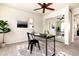 Bright office space with modern desk, décor, and a spacious mirrored closet at 18397 E Alabama Pl # D, Aurora, CO 80017