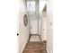Inviting entryway features a high ceiling, wood floors, and a decorative clock at 18397 E Alabama Pl # D, Aurora, CO 80017