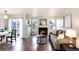 Inviting living room with hardwood floors, fireplace, and comfortable seating at 18397 E Alabama Pl # D, Aurora, CO 80017